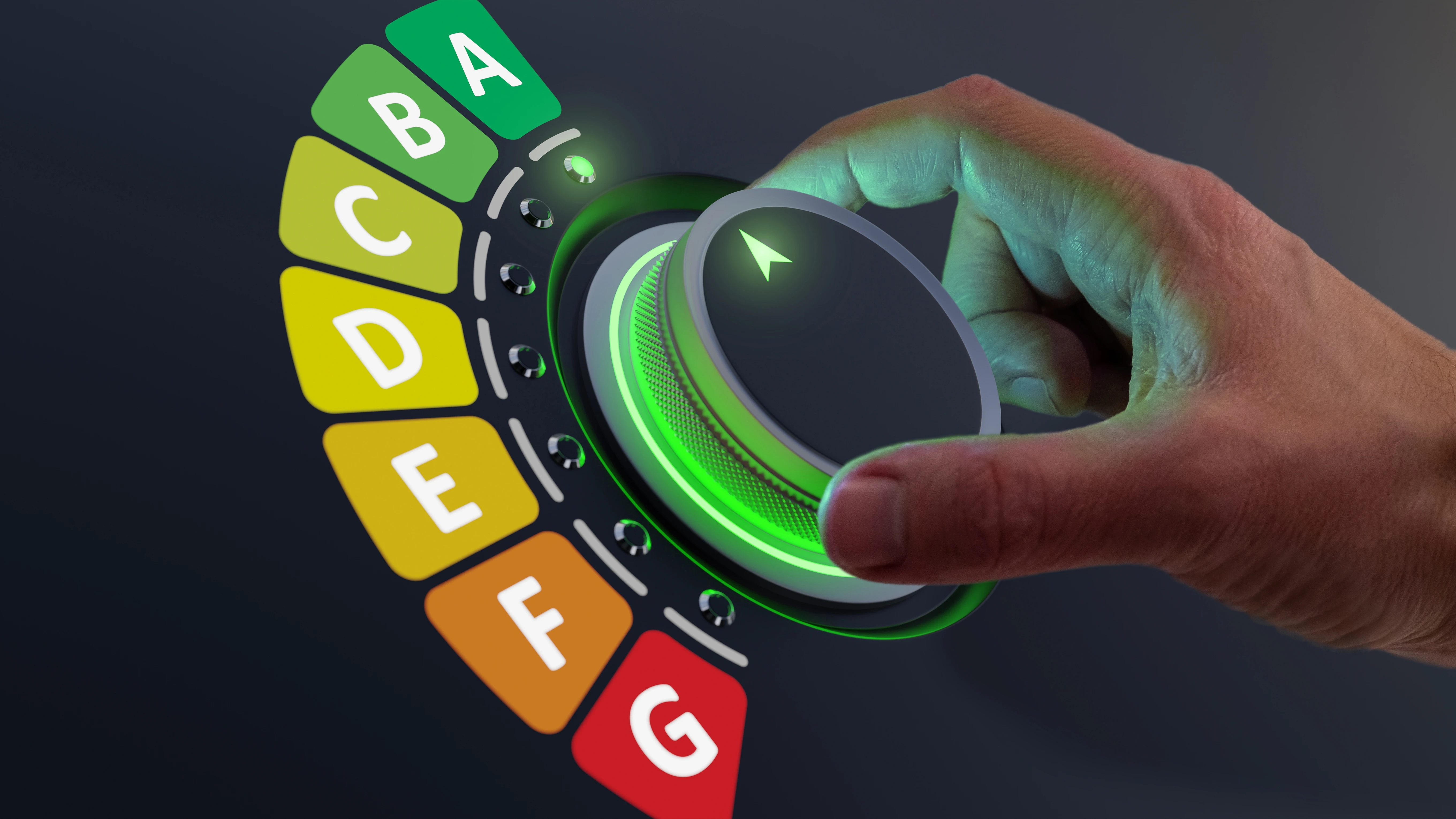 Hand adjusting a dial to represent EPC ratings - moving from red to green
