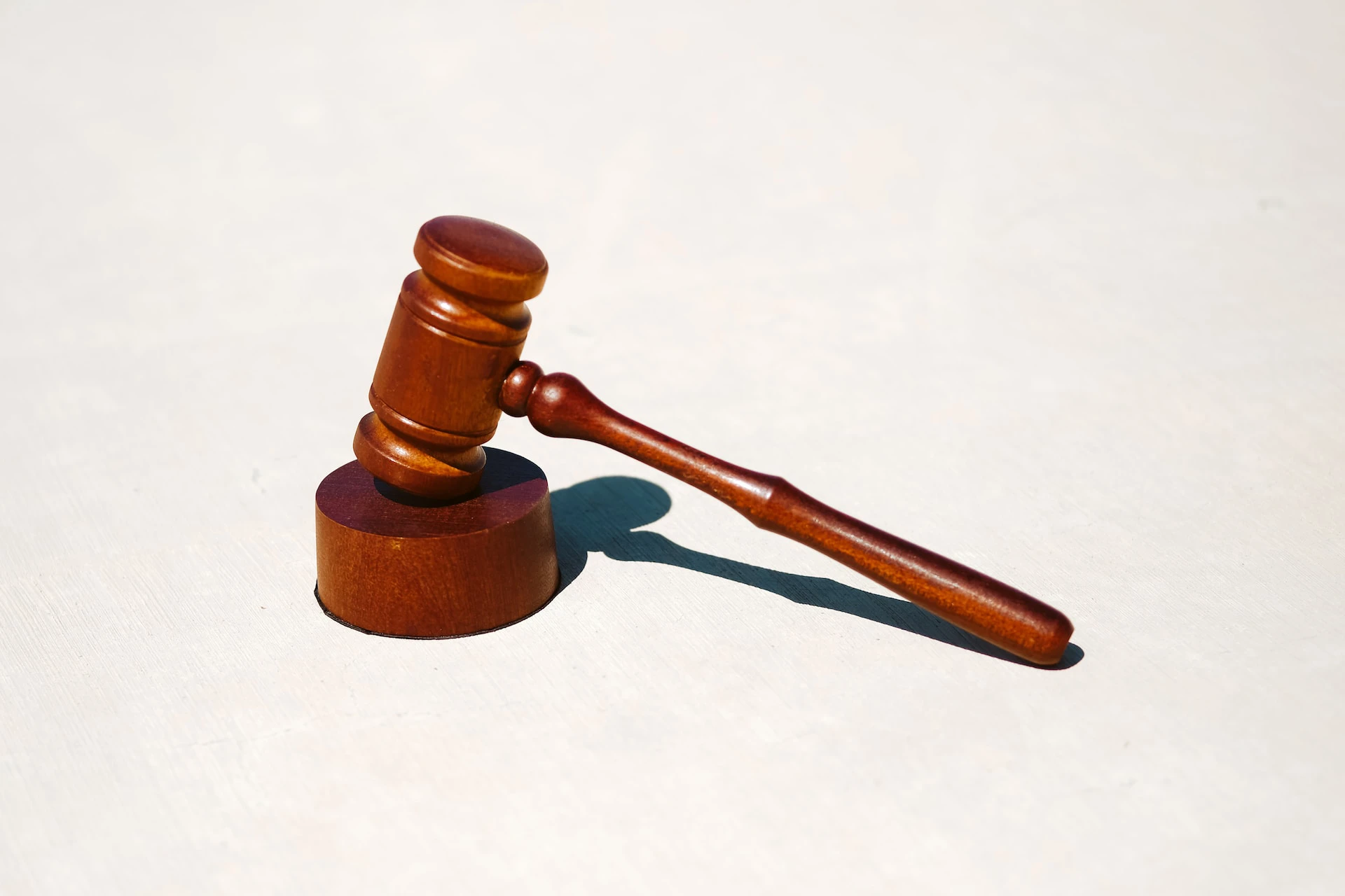 Wooden gavel on white background